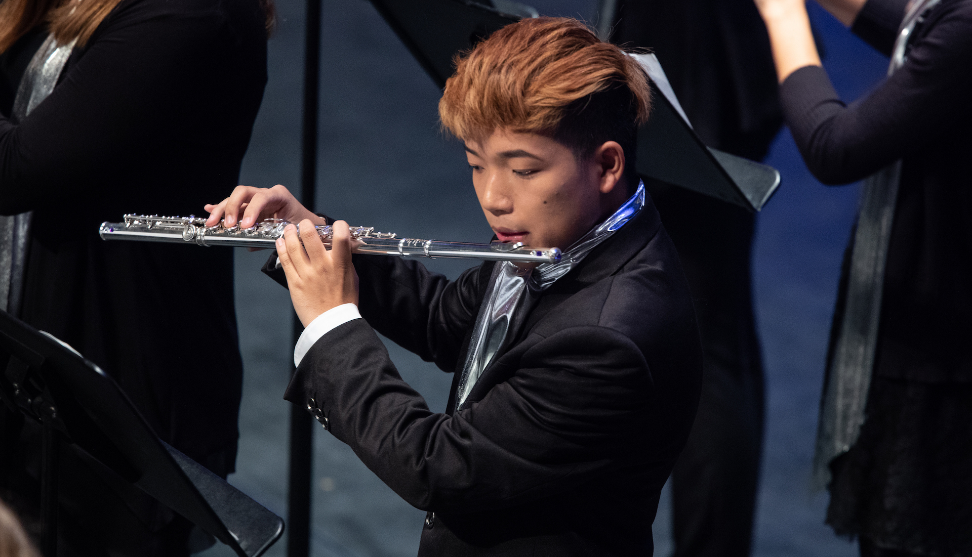 UNI student playing the flute