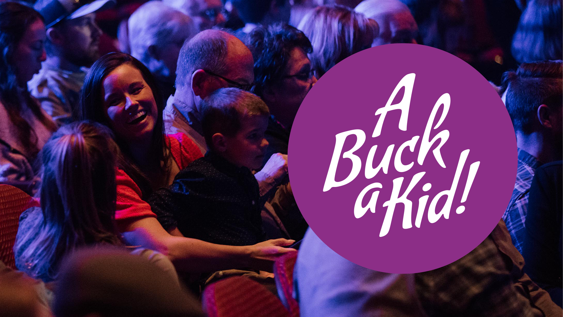 Text reads "A Buck a Kid!" over a photo of a dimly-lit audience, featuring a mom smiling with her two children