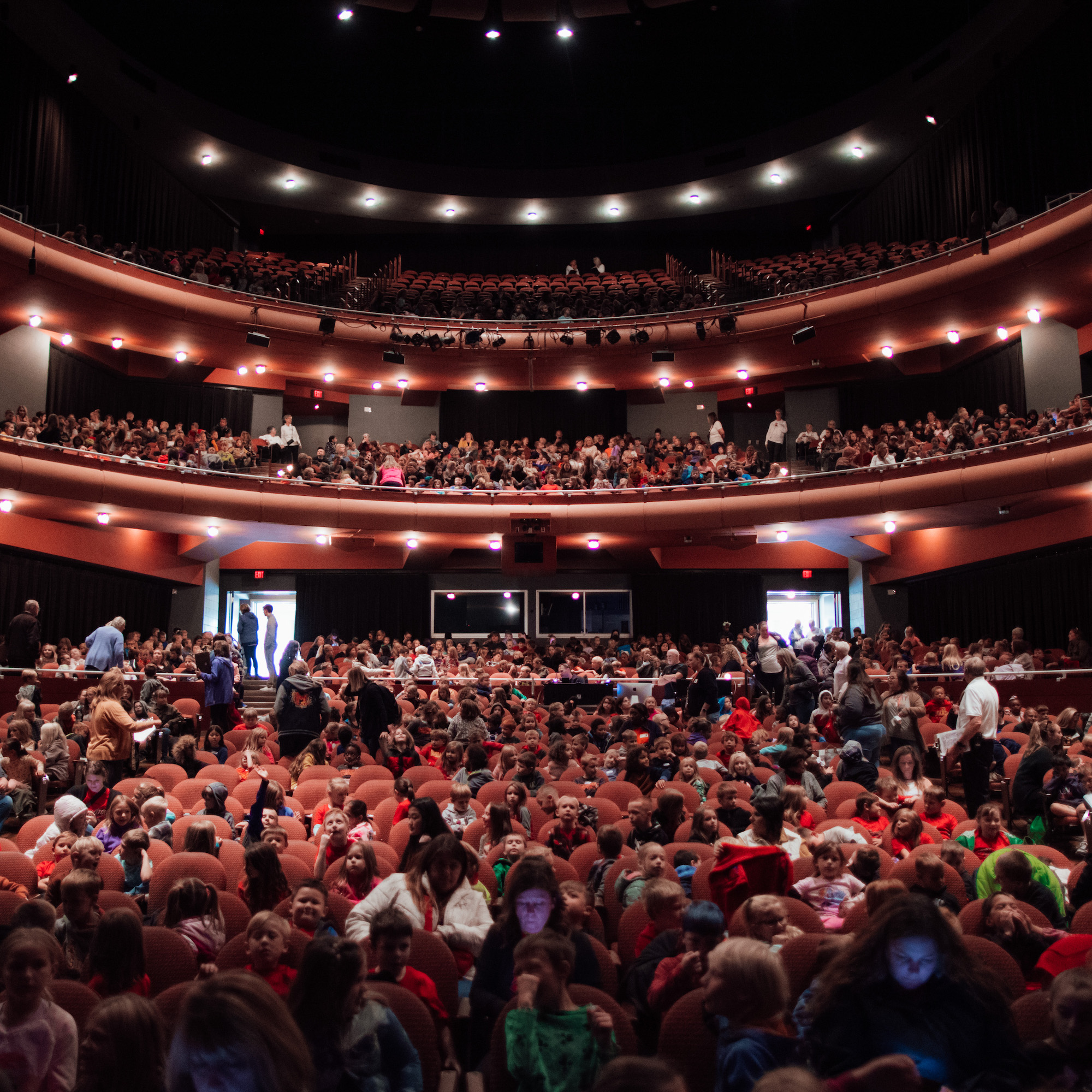 The Gallagher Bluedorn full of young children ready for a show