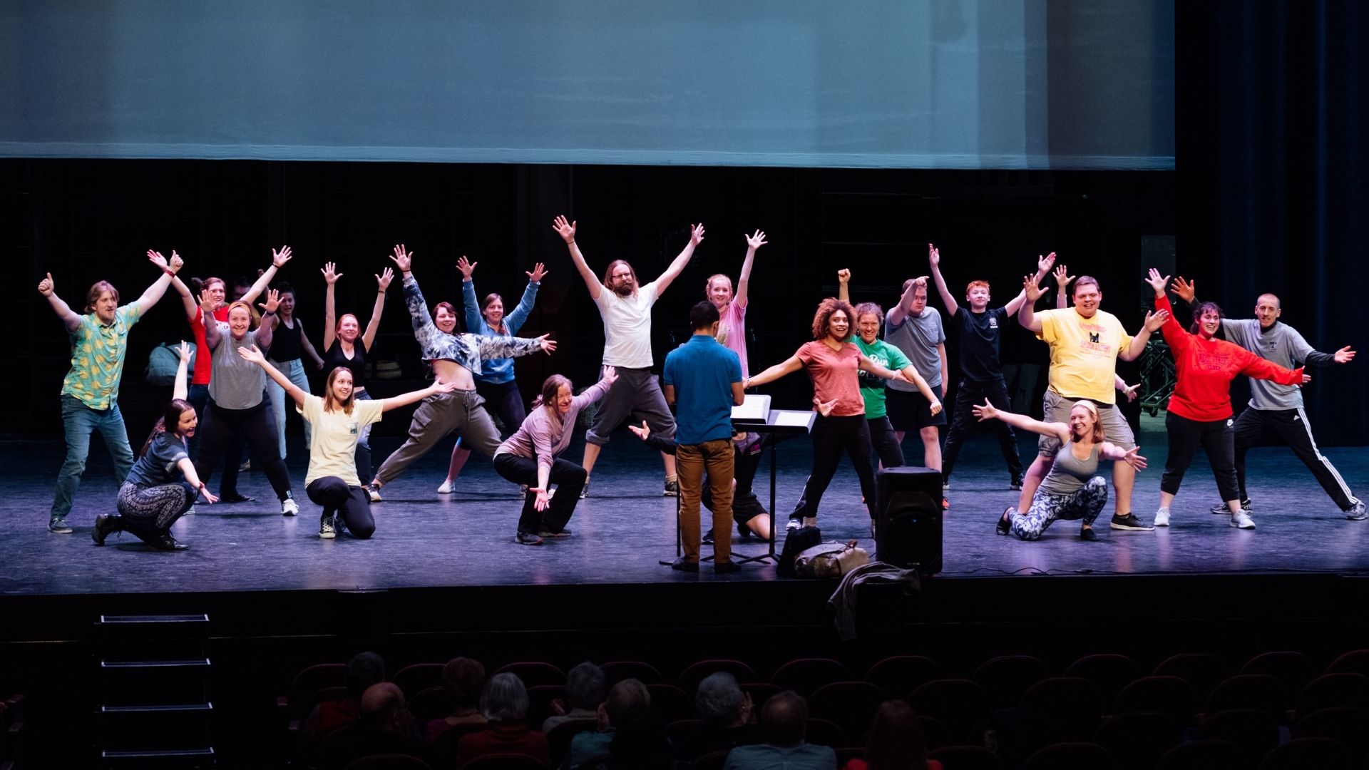 Cast of Joseph on stage pose at the end of a number. 