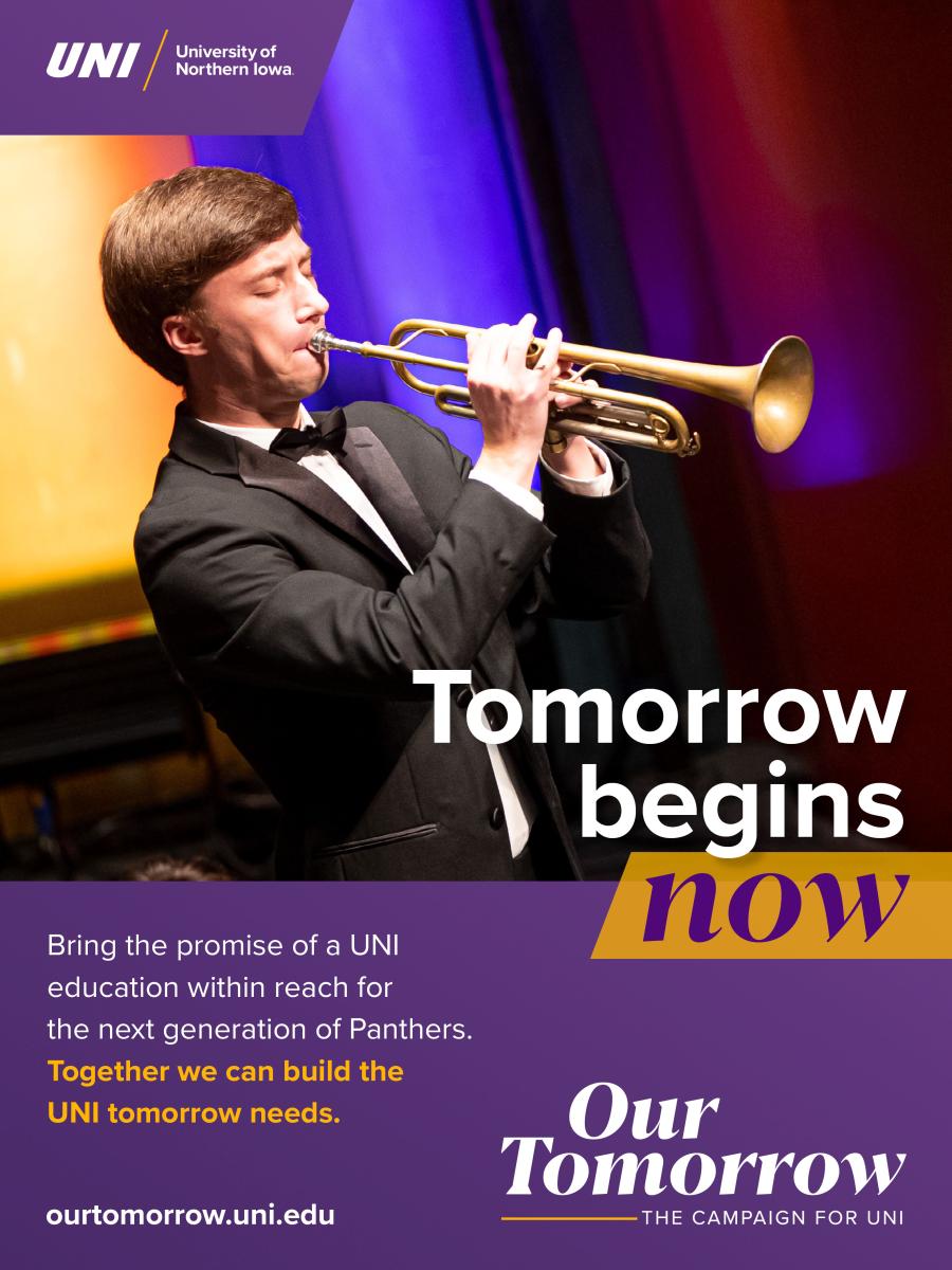 Young man playing a trumpet