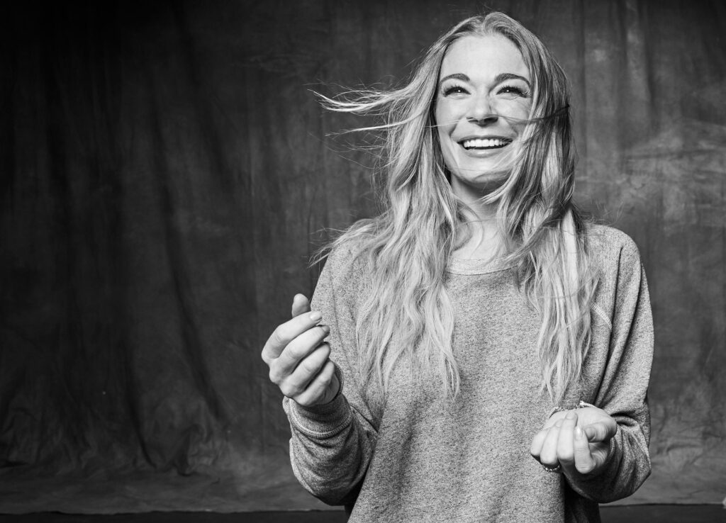 LeAnn Rimes on black background header