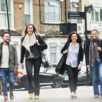 Elias String Quartet members walking on a street