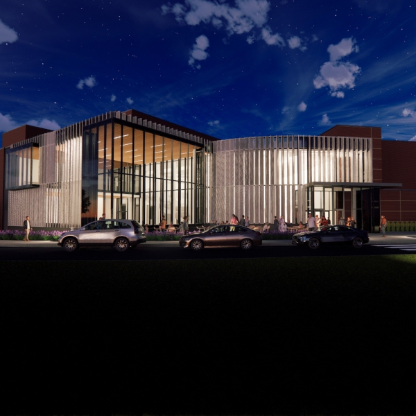 Dusk rendering of the buidling with lots of outdoor light and a large glass facade