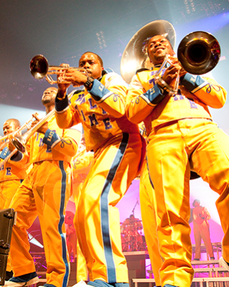 Drumline Live players on stage
