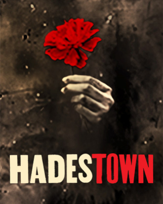A hand holding a rose. Text reads: HADESTOWN